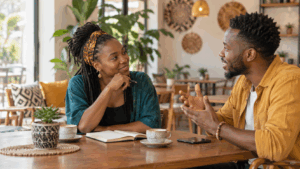Two people using Swahili conversation questions to continue a friendly conversation